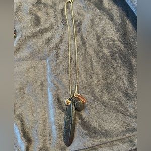 Coach charm necklace.